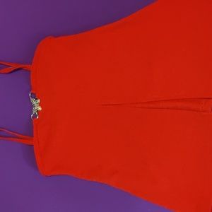 Red tank top with silver butterfly accent